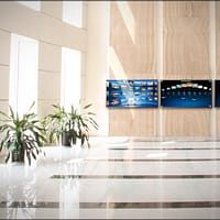 a video wall installed in the hallway of a building