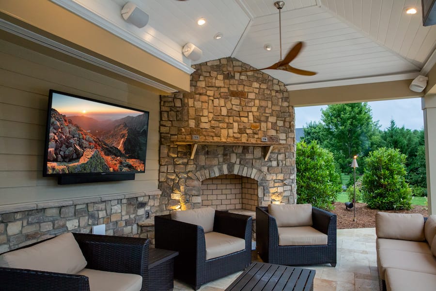 A patio with a wall-mounted SunBrite TV.