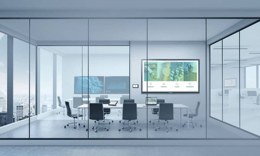 A meeting room with glass windows.